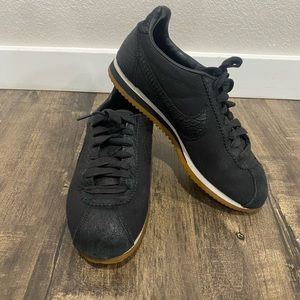 Black Nike Cortez sneakers for ladies